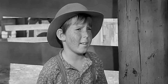 Stephen Wooton as 'Dodie' Jarrett, the young boy who admires Clay Anderson in Stranger at My Door (1956)