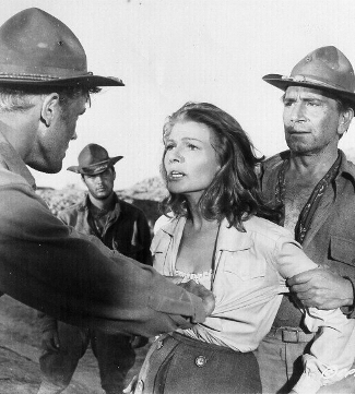 Tab Hunter as Lt. William Fowler, Rita Hayworth as Adelaide Geary and Richard Conte as Cpl. Milo Trubee in They Came to Cordura (1959)