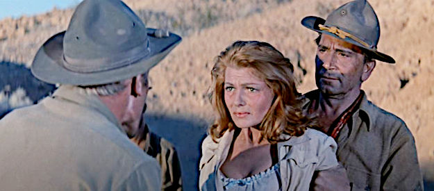 The Medal of Honor nominees search Adelaide Geary (Rita Hayworth) for Thorn's missing notebook of citations in They Came to Cordura (1959)