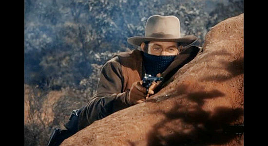 Vaughn Monroe as Rhiannon, robbing a stagecoach in Singing Guns (1950)