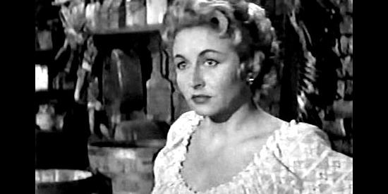Vera Ralston as stage way station worker Cheel, quickly growing attracted to the wrongly accused Juan Morales in Gunfire at Indian Gap (1957)