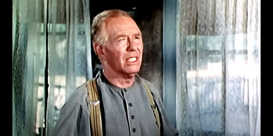 Walter Baldwin as Vince Webb, trying to convince his daugther that they need to tell the truth about a shooting they witnessed in Stranger on Horseback (1955)