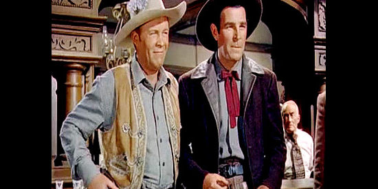 Wayne Morris as Barney Broderick and Rod Cameron as Grif Holbrook, standing tall together in Stage to Tucson (1950)