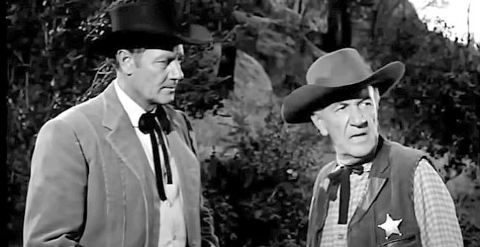 Joel McCrea as Mike Ryan and Addison Richards as Sheriff Jones, working to solve a rash of robberies in Gunsight Ridge (1957)