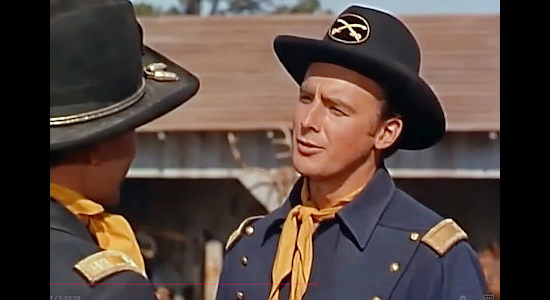 Jerome Courtland as Lt. Nowlan, discussing what makes a good cavalry horse with Capt. Keough in Tonka (1956)