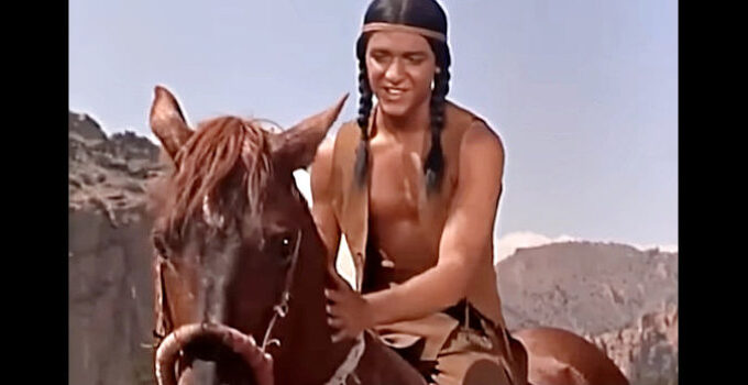 Sal Mineo as White Bull with the captured wild horse he named Tonka in Tonka (1956)