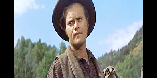 Vic Morrow as Lars Peterson, whose family has a long-standing grudge against Jeremy Rodock in Tribute to a Bad Man (1956)