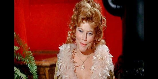 Anne Jackson as Belle Nops, owner of the whorehouse and mayor of Yearkey’s Hole in Dirty Dingus Magee (1970)