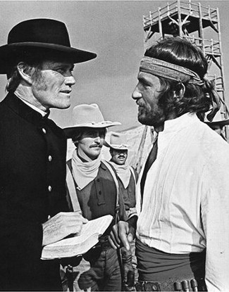 Chuck Connors as Reynolds with Bekin Fehmiu as Capt. Victor Kaleb in The Deserter (1970)