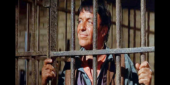 Frank Sinatra as Dingus Magee, finding himself in Hoke Birdsill's jail, at least for the time being, in Dirty Dingus Magee (1970)