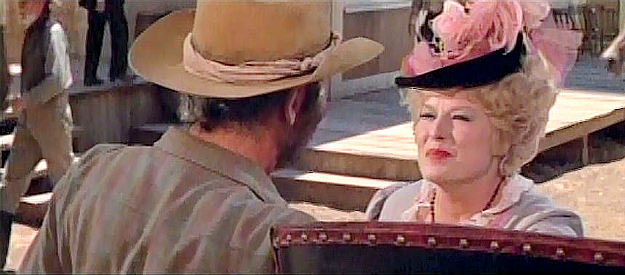 Jean Willes as Alice, inviting Harley Sullivan (Henry Fonda) to feast at her establishment in The Cheyenne Social Club (1970)