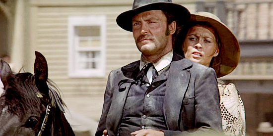 Stacey Keach as Doc Holliday and Faye Dunaway as Katie Elder ride into Tombstone in Doc (1971)