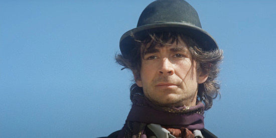 Anthony Perkins as Rev. LaSalle, bringing religion -- or something of the sorts -- to the judge in The Life and Times of Judge Roy Bean (1972)