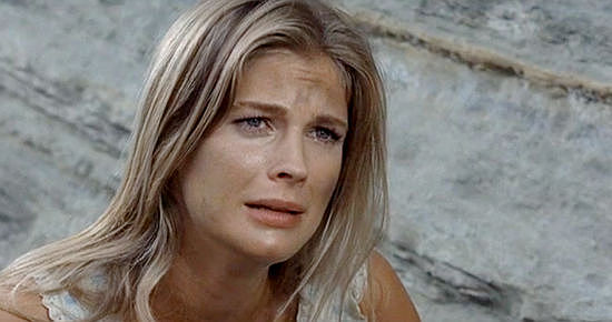 Candice Bergen as Melissa Ruger, despondent as another of Frank Calder's men dies in The Hunting Party (1971)