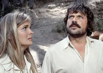 Candice Bergen as Melissa Ruger with Oliver Reed as Frank Calder in The Hunting Party (1971)