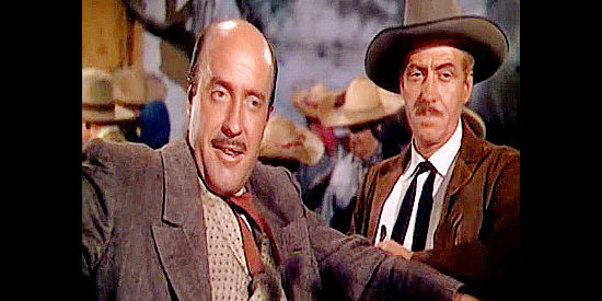 Fred Clark as Basil Danzeeger and Frank Fraylen as Hyatt, the man who supplies his ranch with gun hands in The Eagle and the Hawk (1950)