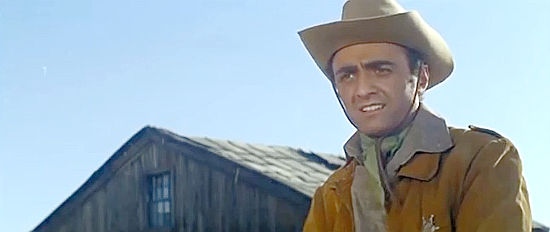 Guido De Salvi as Silver City Sheriff Norman Ford, investigating the theft of $200,000 in RIngo's Big Night (1965)