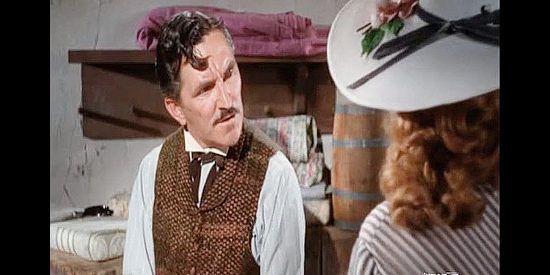 Howard McNear at Watson, the store owner who provides transportation and supplies to the Rebel escapees in Escape from Fort Bravo (1953)