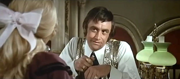 James Booth as Harry Wheeler, the saloon owner in love with Alexandra in Macho Callahan (1970)