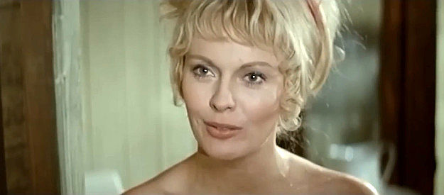 Jean Seberg as Alexandra Mountford, raising the reward on her husband's killer in Macho Callahan (1970)