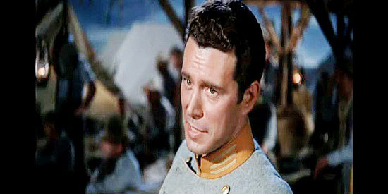 John Forsythe as Capt. John Marsh, carefully planning an escape from a prisoner of war camp out West in Escape from Fort Bravo (1953)