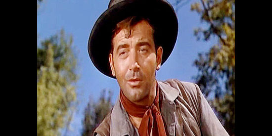 John Payne as Capt. Todd Croyden, setting sights on Madeline Danzegger for the first time in The Eagle and the Hawk (1950)