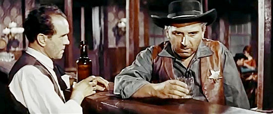 Jose Bodalo as Tombstone sheriff Sam Murdock, trying to drink away his trouble in Ringo's Big Night (1965)
