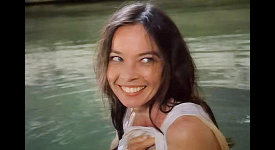 Leslie Caron as Sister Mary, caught bathing by her new friend Madron in Madron (1970)