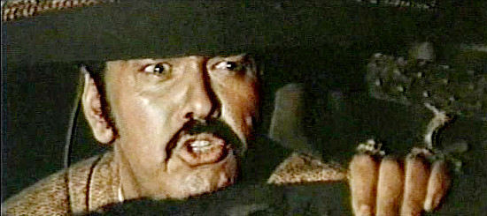 Lucio De Santis (Louis Santis) as Laredo, the man determined to free Jane from Rocco's grip in Vengeance (1968)
