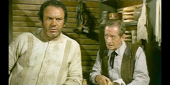 Mario Brega as Miguel Cortinez and Richardo Canales as Joe Harmon in The Ugly Ones (1966)