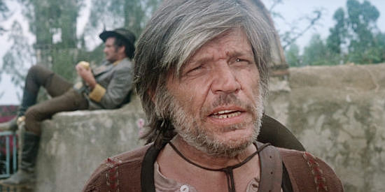 Neville Brand as Choo Choo, the outlaw gang member with a club for a hand in The Deadly Trackers (1973)
