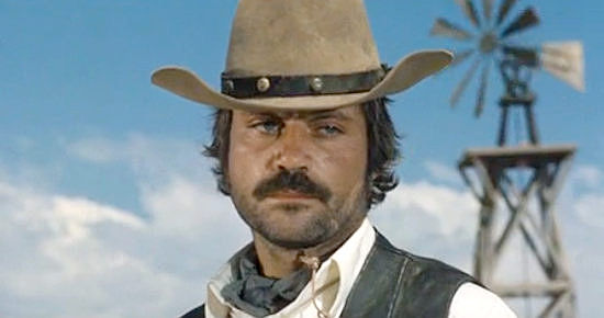 Oliver Reed as Frank Calder, an outlaw deciding it's time to learn to read in The Hunting Party (1971)