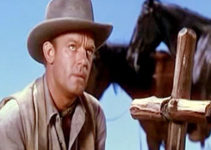 Dennis O'Keefe as U.S. spy Whitney Randolph, south of the border in The Eagle and the Hawk (1950)