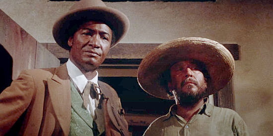 Paul Benjamin as Jacob, bringing a client to Maria, his newly purchased whore in The Deadly Trackers (1972)