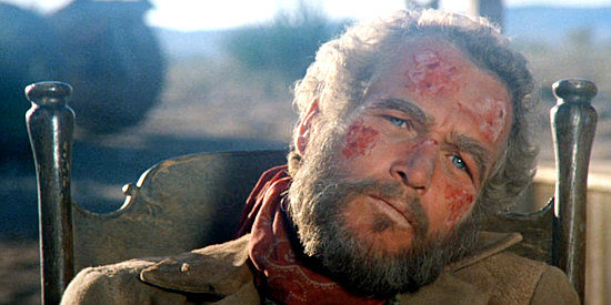 Paul Newman as Roy Bean, resting after going on a killing spree against men who tried to hang him in The Life and Times of Judge Roy Bean (1972)