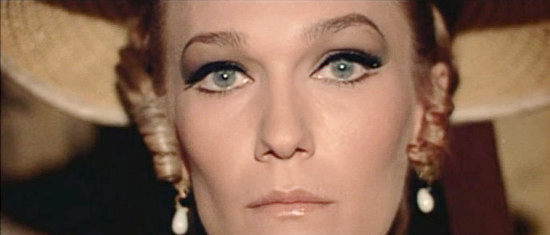 Rada Rassimov as Miss Tebel in Machine Gun Killers (1968)
