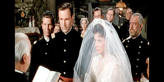 Richard Anderson as Lt. Beecher and Polly Bergen as Alice Owens, getting married in Escape from Fort Bravo (1953)