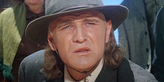Richard Harris as Sean Kilpatrick, realizing he's lost his wife and son in The Deadly Trackers (1973)