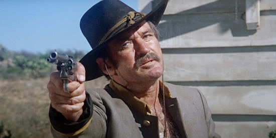 Rod Taylor as Frank Brand, leader of the outlaw gang that stirred Sean Kilpatrick's thirst for revenge in The Deadly Trackers (1973)