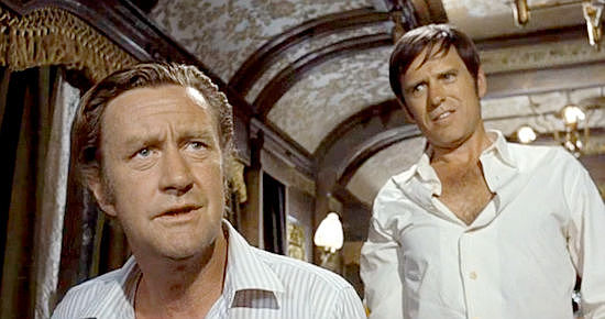 Ronald Howard as Wat Nelson and G.D. Spradlin as Sam Bayard, two members of Brandt Ruger's The Hunting Party (1971)