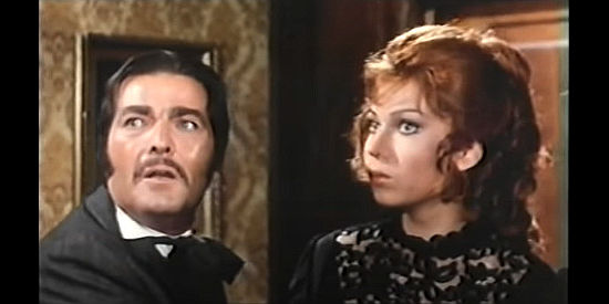 Rosario Borelli as Barney Solvey hears from a ghost while in the company of Lucy (Veronika Korosec) in Pistol Packin’ Preacher (1972)