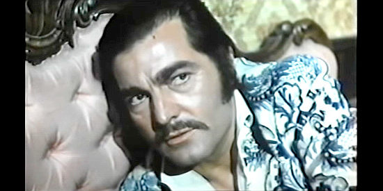 Rosario Borelli as Barney Solvey, planning the seduction of Lucy in Pistol Packin’ Preacher (1972)