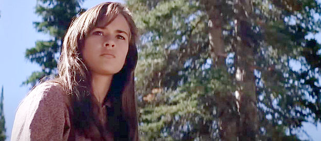 Sydney Penny as Megan Wheeler, a young girl about to ride into trouble in Pale Rider (1985)