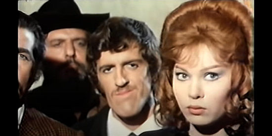 Ugo Fangareggi as Sacristan, the church caretaker and Veronika Korosec as Lucy listen to an unothodox sermon in Pistol Packin' Preacher (1972)