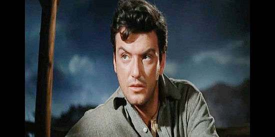 William Campbell as Cabot Young, the hot-headed young Rebel planning a dash for freedom in Escape from Fort Bravo (1953)