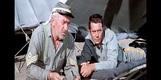 William Demarest as Campbell and John Forsythe as Capt. John Marsh, watching Carla and Roper get closer in Escape from Fort Bravo (1953)