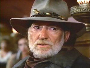 Willie Nelson as Cross in Where's the Hell That Gold (1988)