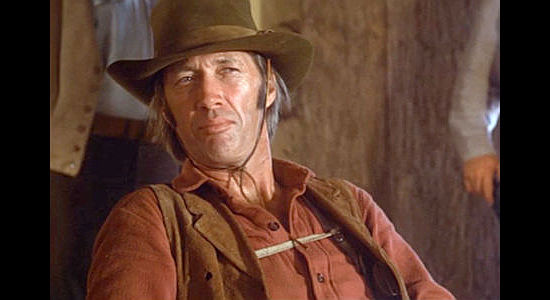 David Carradine as Ben Irons, the man at the heart of the conflict between Sheriff Ward and Will Kane in High Noon II, The Return of Will Kane (1980)