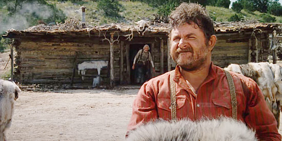 Dennis Hill as Calvin Calver, alerting his father that the windmill has been restored in Driscoll in Red Headed Stranger (1986)