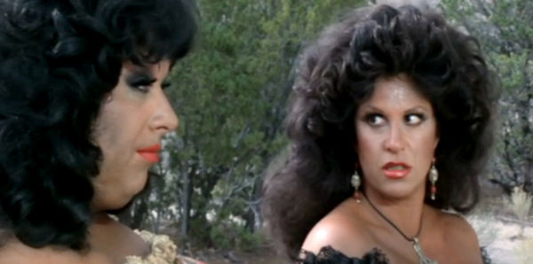 Devine as Rosie Velez and Lainie Kazan as Marguerita, putting their differences aside for a moment in Lust in the Dust (1985)